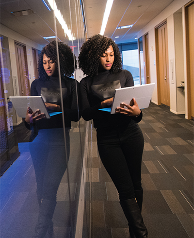 photo of woman with computer